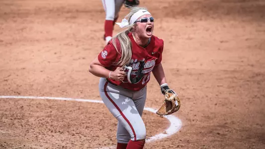 Kayla Beaver (19) celebrates after striking out the final batter to defeat Georgia (March 17, 2024)