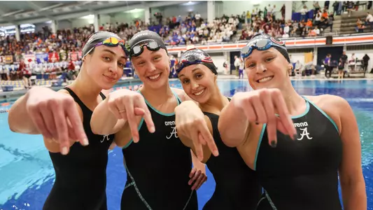 Women's relay team posed