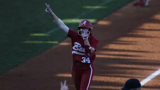 Marlie Giles (34) celebrates heading home after a home run vs. Arizona (March 2, 2024)