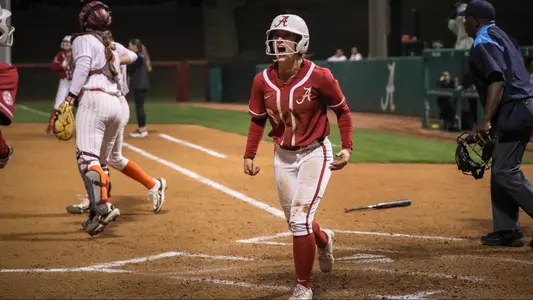 Kinley Pate (6) celebrates at home after scoring the go-ahead run vs. Virginia Tech (March 22, 2024)