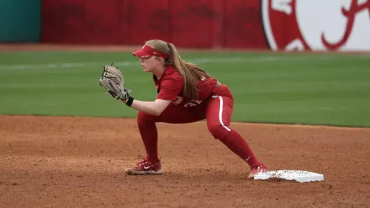 Alabama softball player Kenleigh Cahalan playing infield against Arizona,