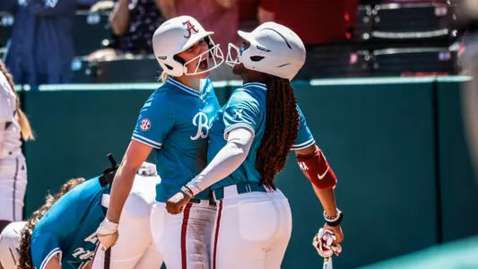 Jenna Johnson (88) and Kristen White (3) celebrate after scoring vs. Texas A&M (April 13, 2024)