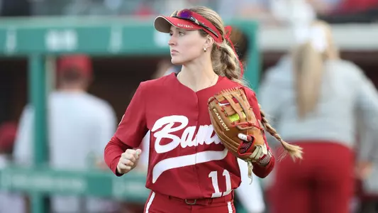 Alabama softball player Larissa Preuitt (11) in the outfield against UAB.