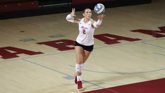 Alabama volleyball player Callie Kieffer serves the ball.