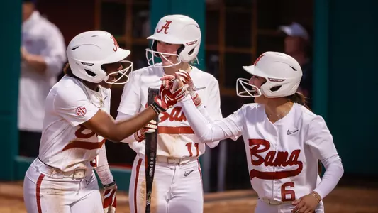 Kristen White (3), Larissa Preuitt (11) and Kinley Pate (6) together at home after scoring vs. Ole Miss (April 5, 2024)