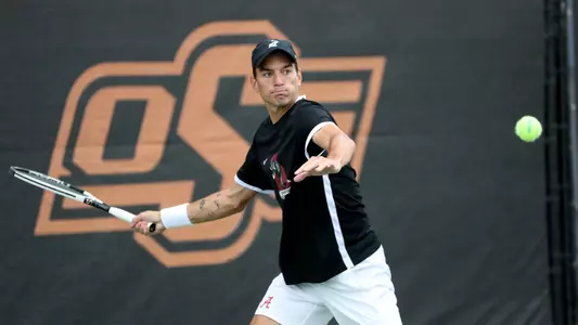 Filip Planinsek hits the ball at the NCAA Singles Round of 16
