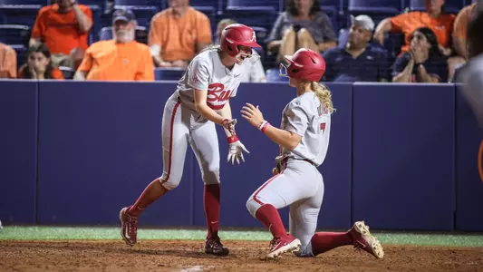 Larissa Preuitt (11) and Bailey Dowling (7) celebrate at home after scoring vs. Auburn (May 3, 2024)