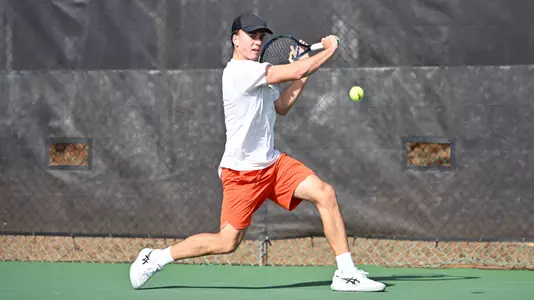 Damien Nezar hitting the ball