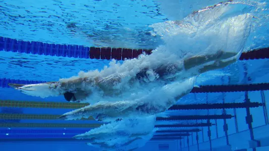 Kristian Gkolomeev diving into the pool at the Olympics