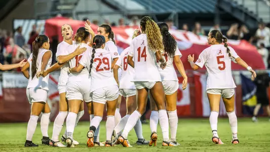 Alabama soccer team celebrates goal over UNA