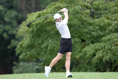 Dominic Clemons tees off during a practice round at North River CC