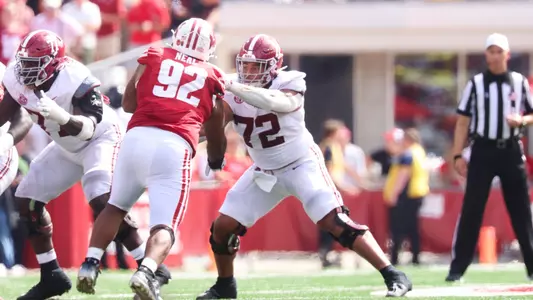 Parker Brailsford blocks a rusher