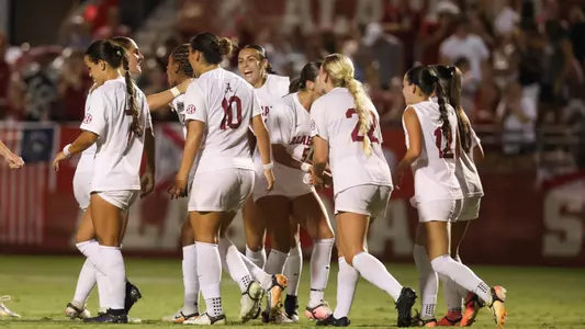 Team celebrates goal against Tennessee