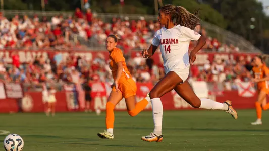 Gianna Paul dribbles down the field