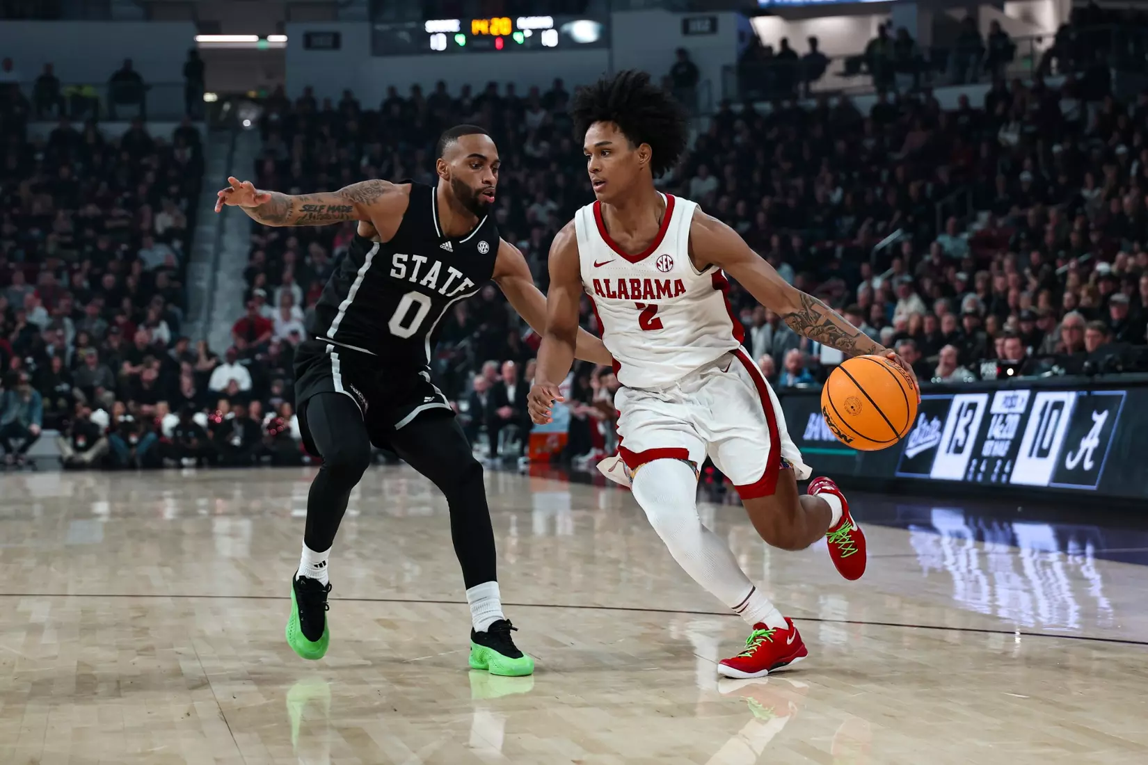 Alabama guard Aden Holloway (2) drives to the rim against MSU at Humphrey Coliseum in Starkville, Mississippi on Wednesday, Jan 29, 2025.