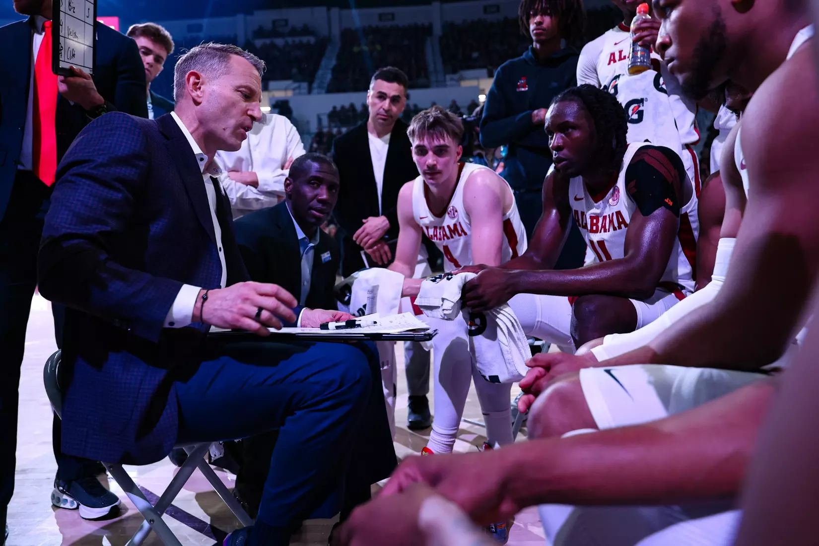 Alabama basketball coach Nate Oats in the huddle with The Alabama Basketball Team at Humphrey Coliseum in Starkville, Mississippi on Wednesday, Jan 29, 2025.