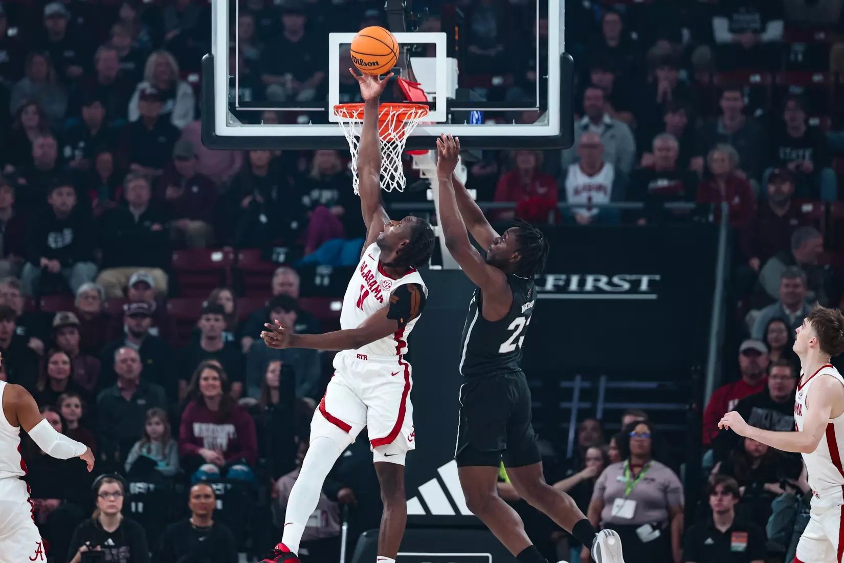 Alabama center Clifford Omoruyi (11) made a crucial block against Michigan State University at Humphrey Coliseum in Starkville, Mississippi, on Wednesday, January 29, 2025.