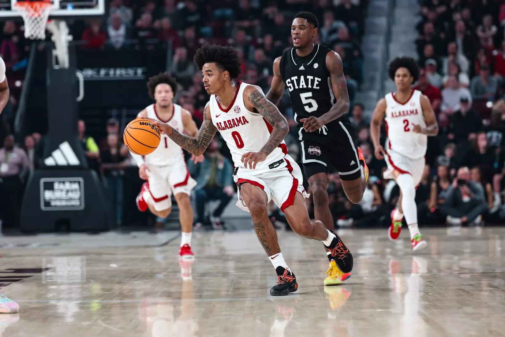 Alabama guard Labaron Philon (0) pushes the ball down the court against MSU at Humphrey Coliseum in Starkville, Mississippi on Wednesday, Jan 29, 2025.