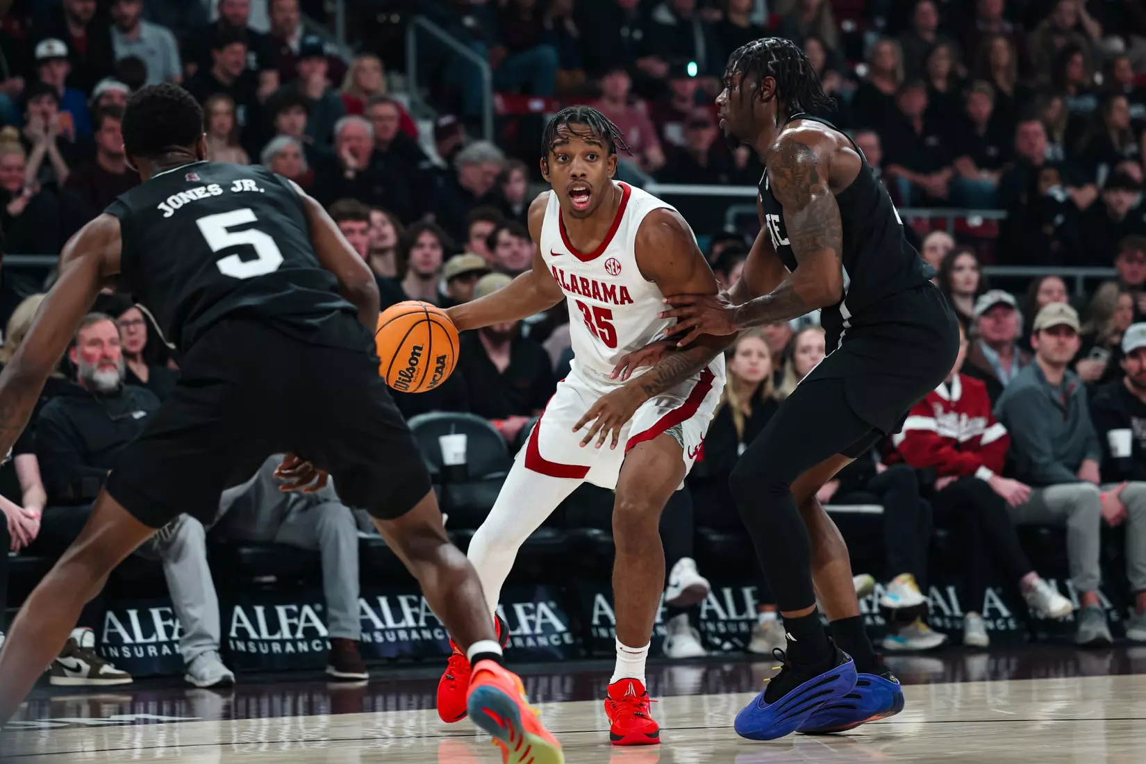 Alabama forward Derrion Reid (35) dribbles the ball against MSU at Humphrey Coliseum in Starkville, Mississippi on Wednesday, Jan 29, 2025.
