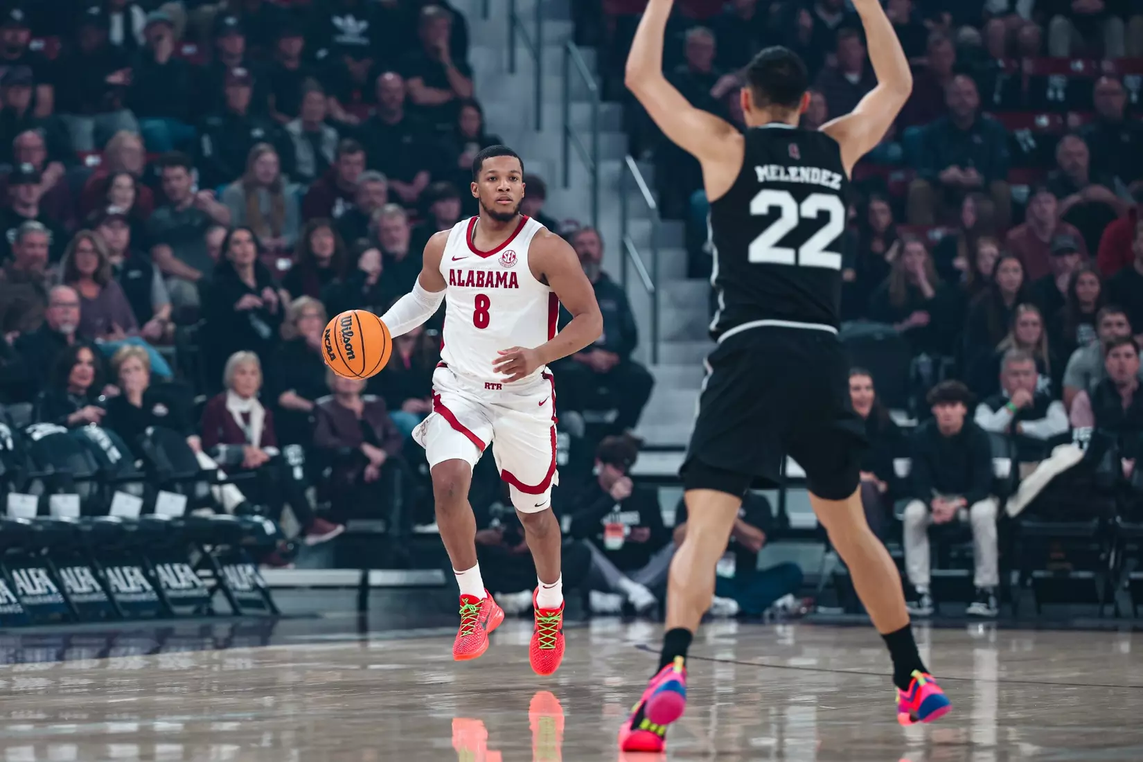 Alabama guard Chris Youngblood (8) dribbles down the court against Michigan State at Humphrey Coliseum in Starkville, Mississippi, on Wednesday, January 29, 2025.