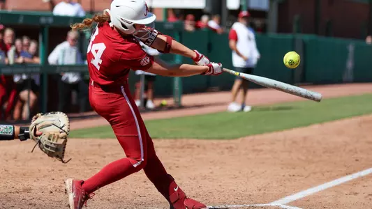 Alabama Softball Player Marlie Giles (34) hitting at the plate during Alabama vs Mississippi State game.