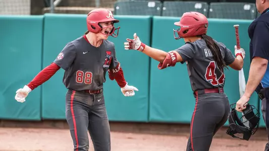 Lauren Johnson (88) celebrates with Salen Hawkins (47) after scoring a run vs. Mercer (Oct. 25, 2025)