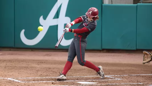 Alabama Softball Player Jena Young swinging during Alabama vs Mercer game.