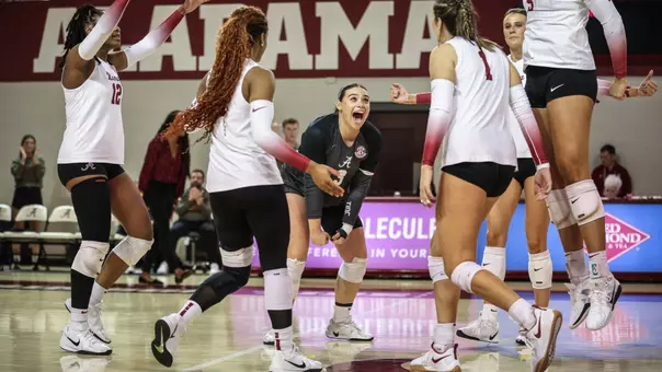 Alabama volleyball players celebrate during a win vs. Vanderbilt (Nov. 14, 2025)