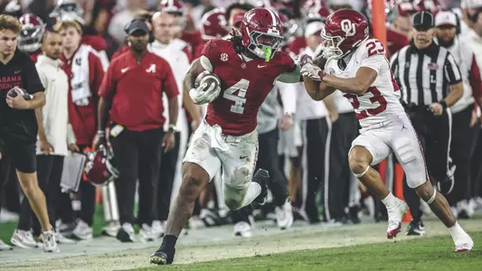 Daniel Hill running the ball against Oklahoma