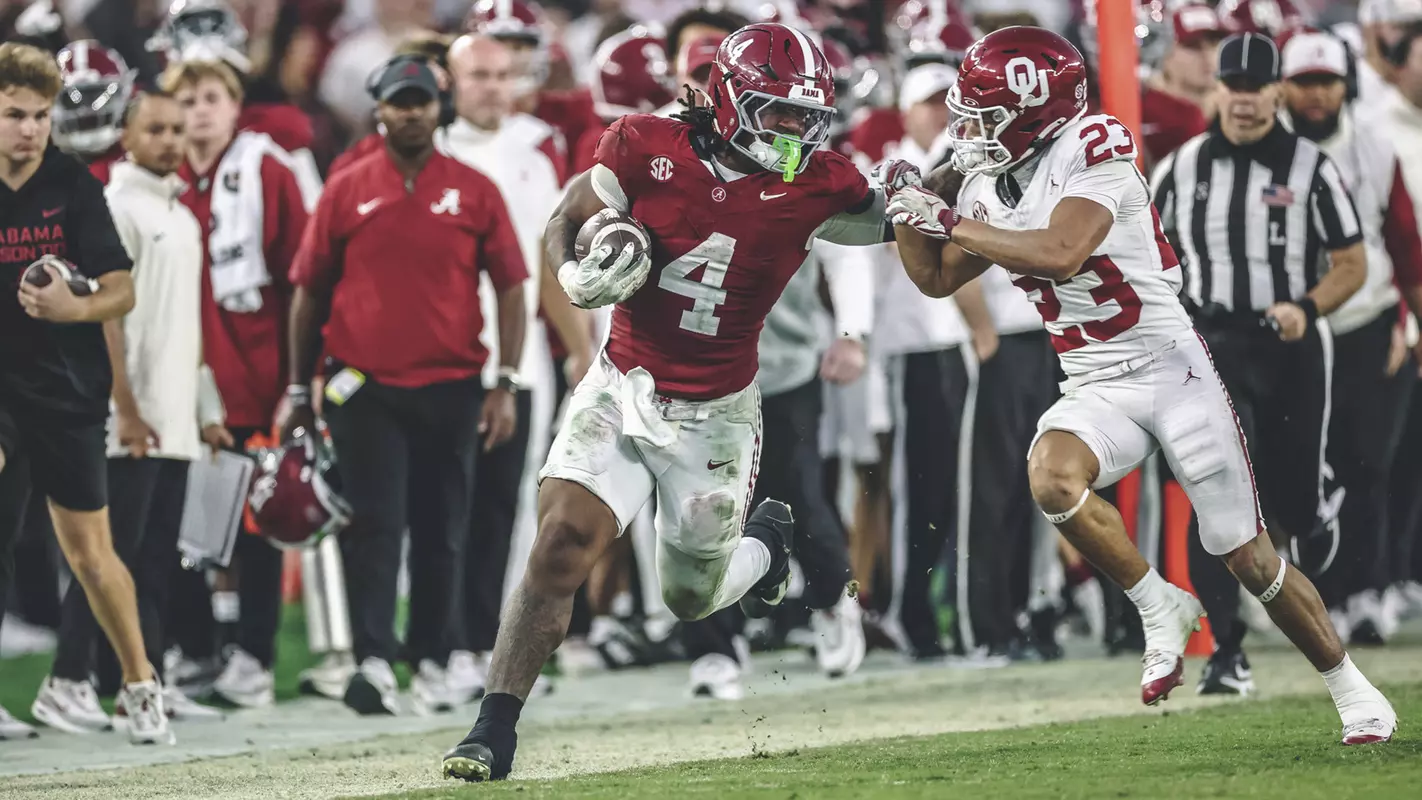Daniel Hill running the ball against Oklahoma