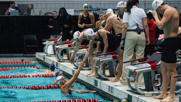 Women's 200 medley relay celebrates win