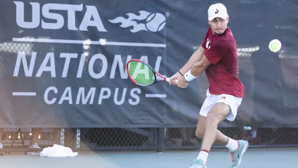 Matic Kriznik hits the ball