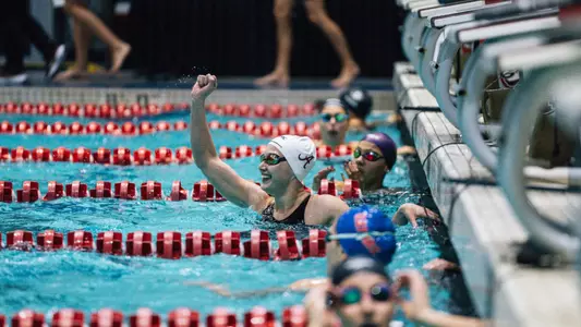 Emily Jones celebrates backstroke win