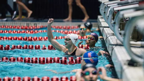 Emily Jones celebrates backstroke win