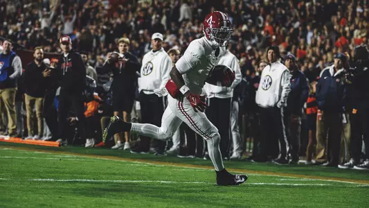 Isaiah Horton running with the ball