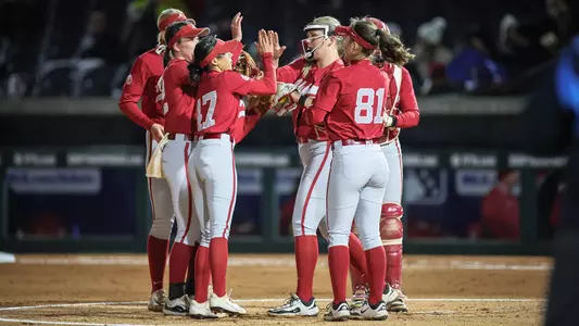Alabama softball players high five pregame vs. Jacksonville State (Feb. 18, 2025)