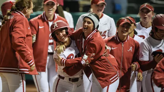 Kennedy Marceaux (1) celebrates with Lauren Johnson (88) after a Marceaux home run vs. Southern Utah (Feb. 21, 2025)