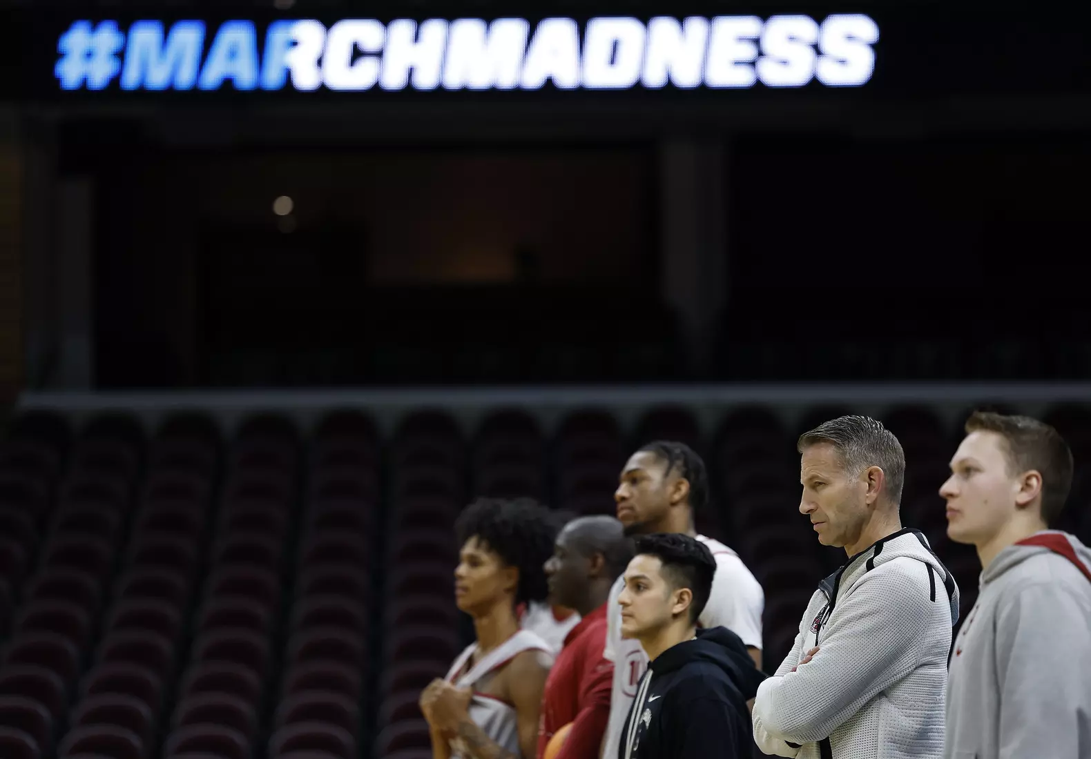 Alabama basketball coach Nate Oats watches drills at Rocket Arena in Cleveland, OH on Saturday, Mar 22, 2025.