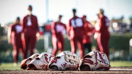 Softball gloves laying on the dirt (March 26, 2025)