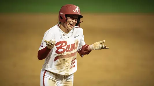 Kali Heivilin (22) shrugs and laughs after a home run vs. Iowa (March 7, 2025)
