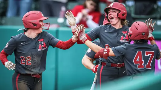 Brooke Ellestad (00) celebrates with teammates vs. Iowa (March 8, 2025)