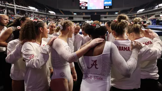 Alabama gymnastic team huddle