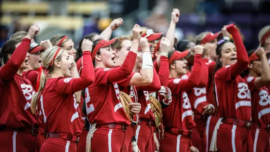 Alabama softball players cheer with fans after a win over LSU (April 6, 2025)