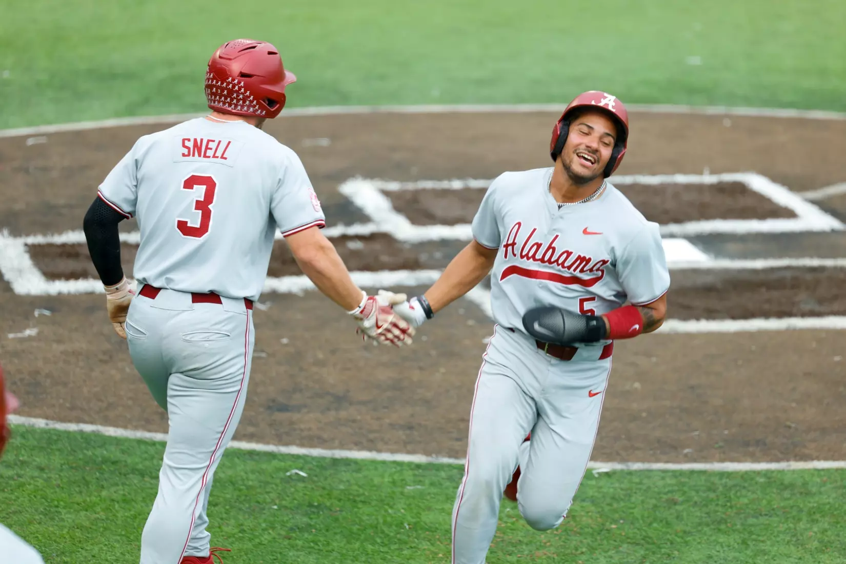 Alabama Baseball Player Kade Snell (3) and Alabama Baseball Player Richie Bonomolo Jr. (5) celebrate against Troy at Riddle-Pace Field in Troy, AL on Tuesday, May 6, 2025.
Photo by Robert Sutton