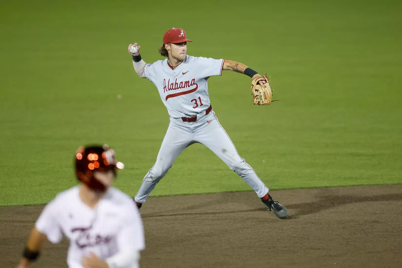 Alabama Baseball Player Jon Young Jr. (31) throws to first against Troy at Riddle-Pace Field in Troy, AL on Tuesday, May 6, 2025.
Photo by Robert Sutton