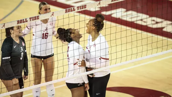 Victoria Barrett (12) and Sarah Stevens (7) celebrate vs. UCF (Sept. 20, 2025)