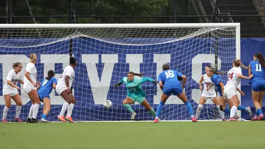 Madi Munguia saving the ball