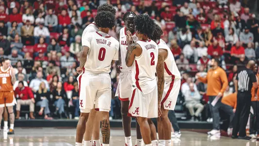 Men's Basketball Huddle vs. Texas