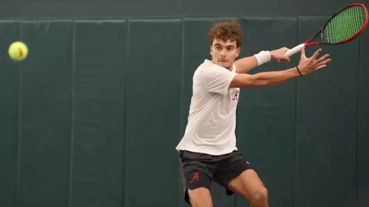 Kriznik hits the ball