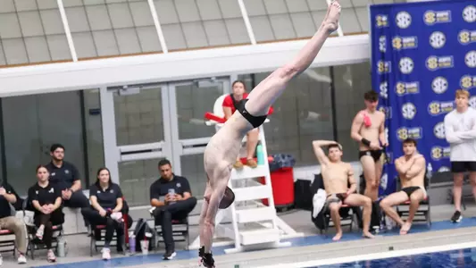 Nigel Chambers dives into the water